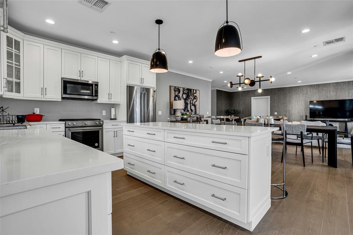 Dining room, Interior, Kitchen, Pendant Lights, Recessed Lighting, Stainless Steel Appliances, Wood Texture Flooring
