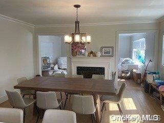 Chandelier, Dining room, Fireplace, Interior, Wood Texture Flooring