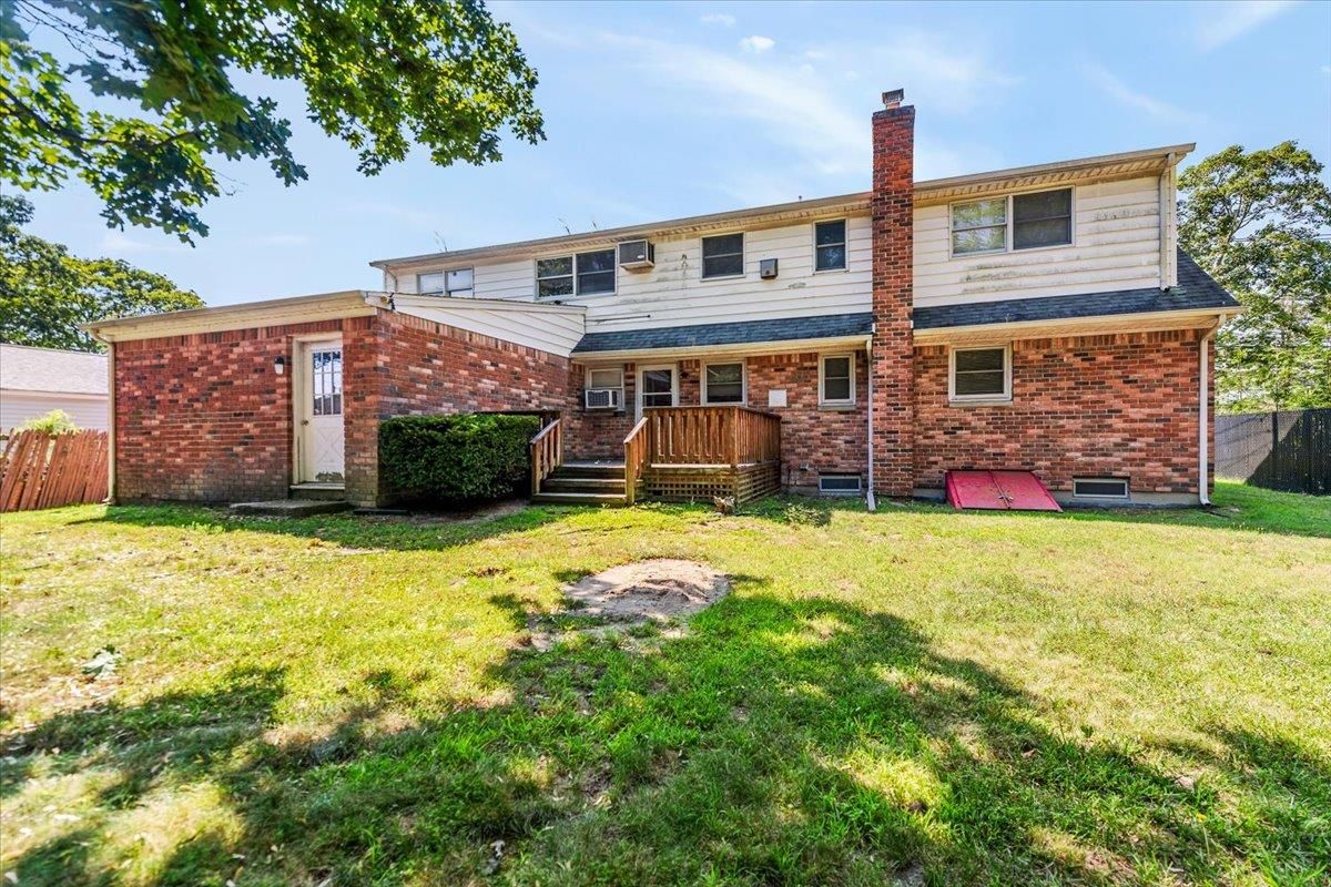 Backyard, Exterior, Facade, Brick Facade, Raised Ranch