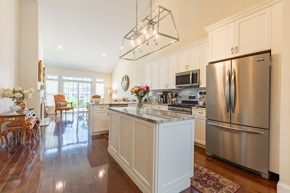 Dining room, Interior, Kitchen, Pendant Lights, Recessed Lighting, Stainless Steel Appliances, Wood Texture Flooring