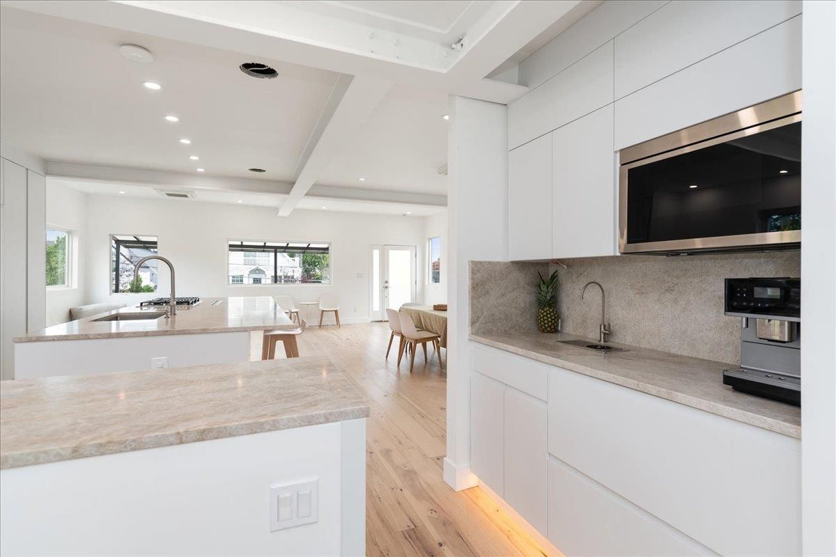 Dining room, Interior, Kitchen, Recessed Lighting, Stainless Steel Appliances, Wood Texture Flooring