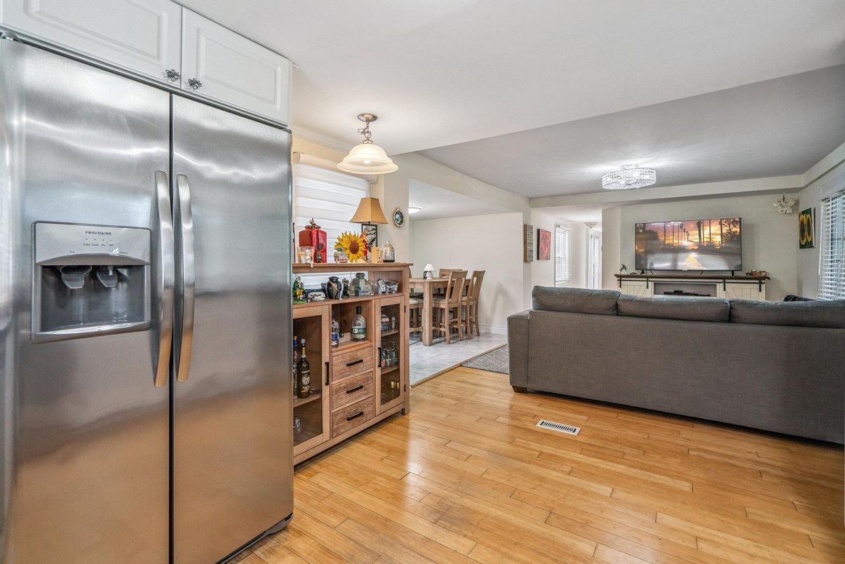 Dining room, Interior, Kitchen, Living room, Pendant Lights, Stainless Steel Appliances, Wood Texture Flooring