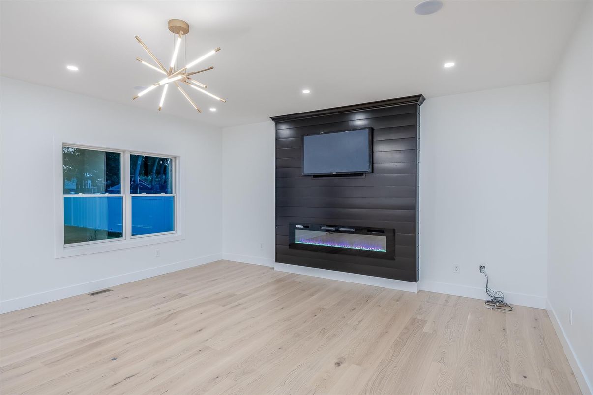 Empty room, Fireplace, Interior, Pendant Lights, Recessed Lighting, Wood Texture Flooring