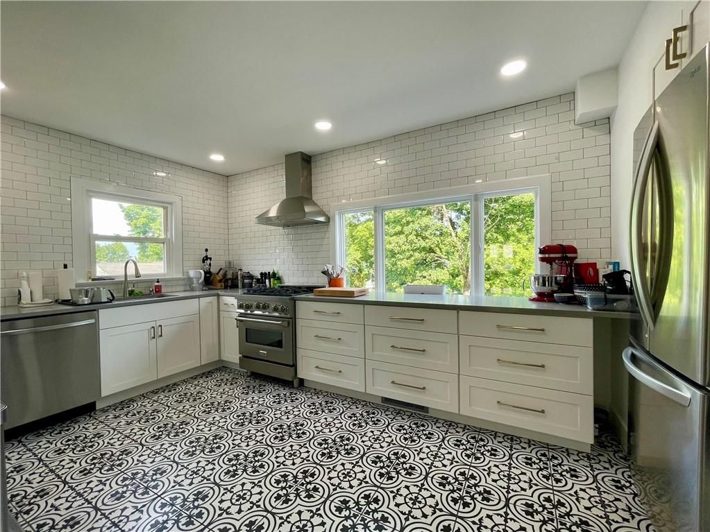 Interior, Kitchen, Recessed Lighting, Stainless Steel Appliances, Stone Walls