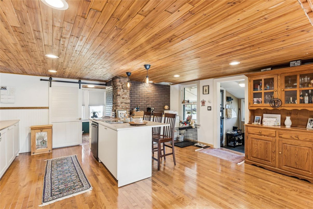Dining room, Interior, Kitchen, Pendant Lights, Recessed Lighting, Stone Walls, Wooden Ceilings, Wood Texture Flooring