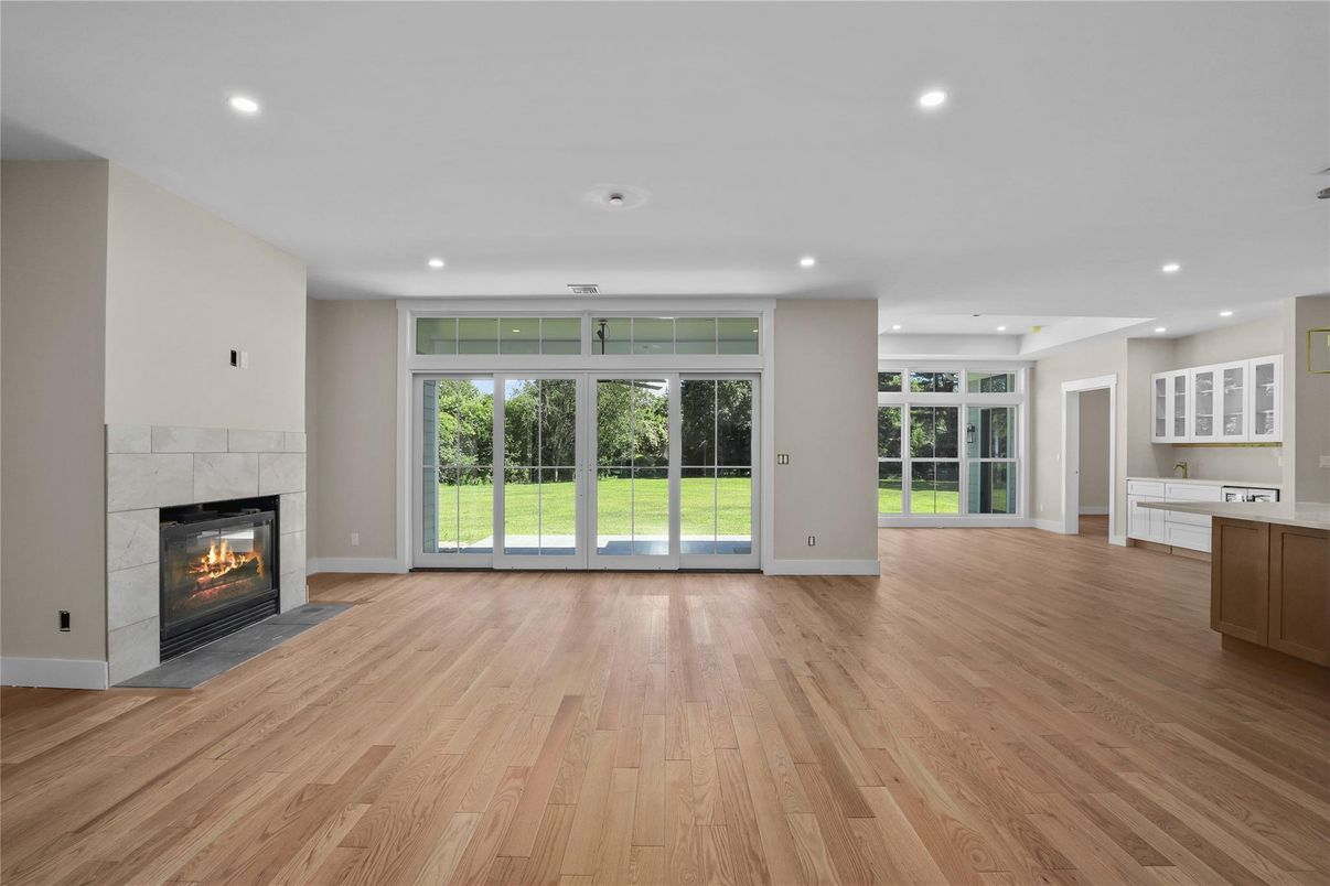 Empty room, Fireplace, Interior, Recessed Lighting, Wood Texture Flooring