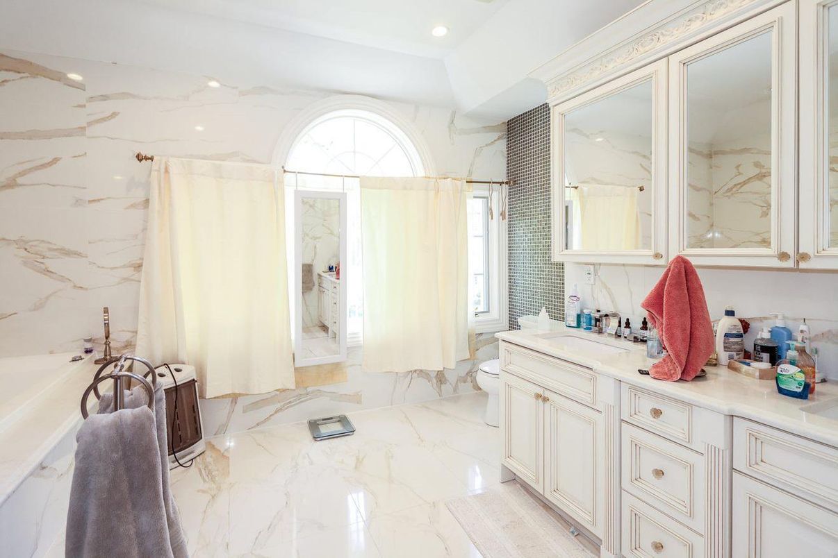 Bathroom, Dual Sink Vanities, Interior, Marble, Marble Walls, Recessed Lighting