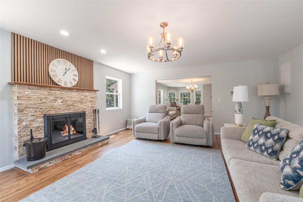Chandelier, Fireplace, Interior, Living room, Recessed Lighting, Wood Texture Flooring