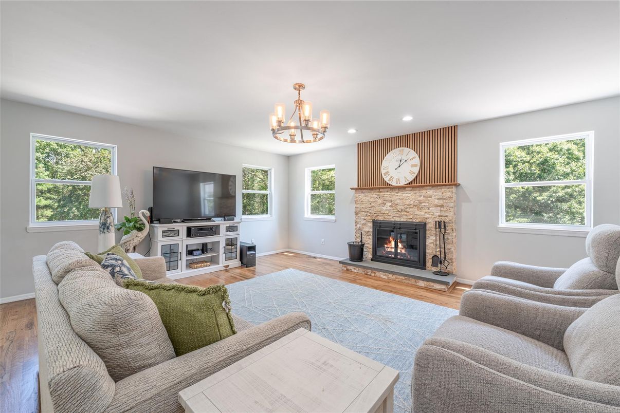 Chandelier, Fireplace, Interior, Living room, Recessed Lighting, Wood Texture Flooring