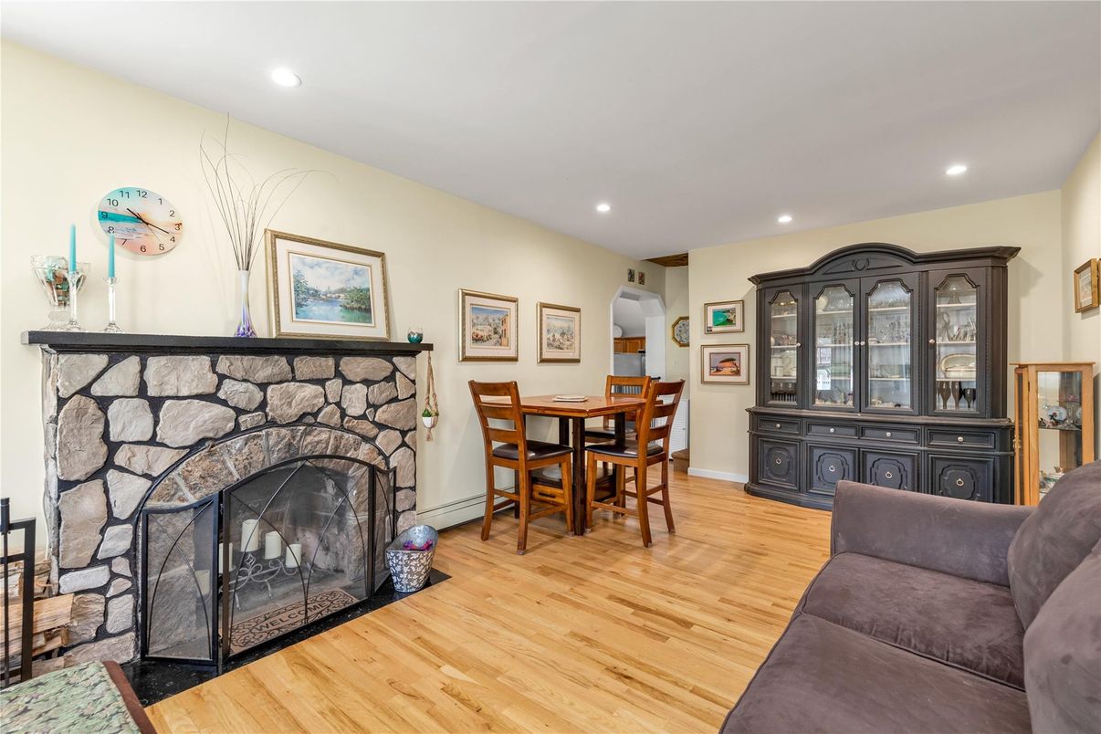 Dining room, Fireplace, Interior, Recessed Lighting, Wood Texture Flooring