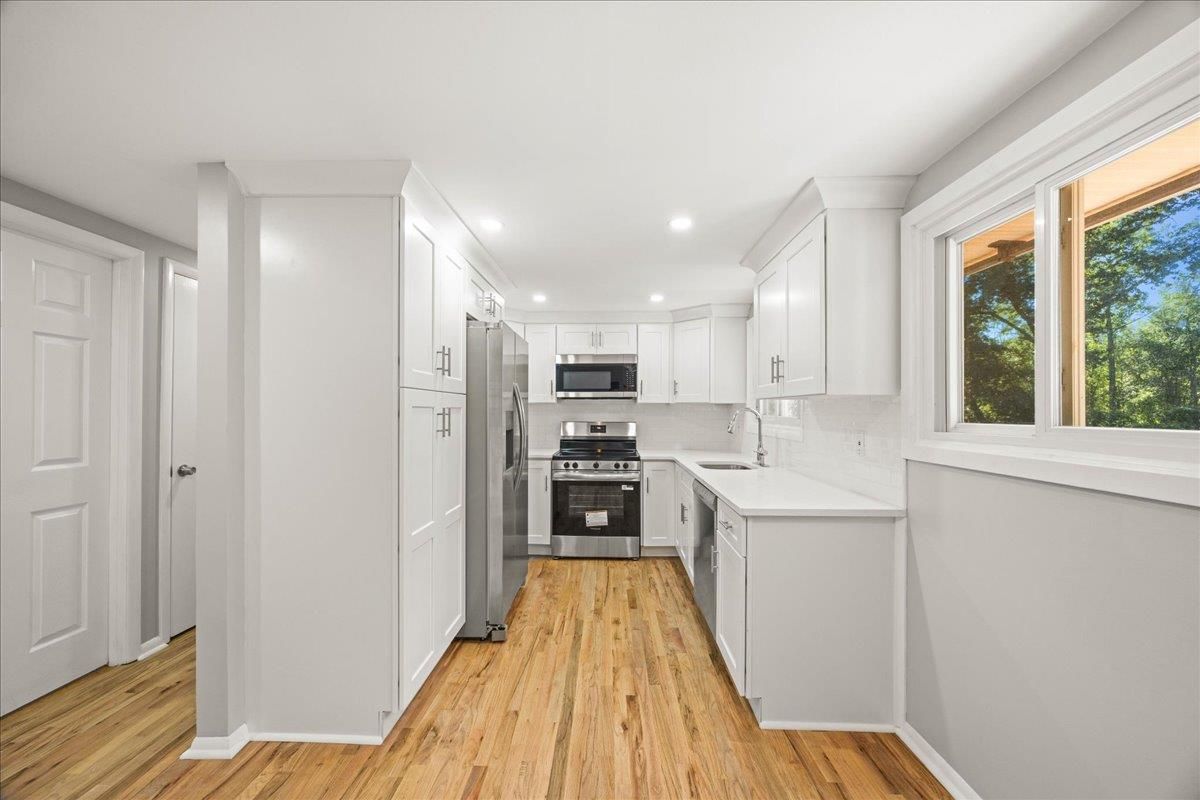 Interior, Kitchen, Recessed Lighting, Stainless Steel Appliances, Wood Texture Flooring