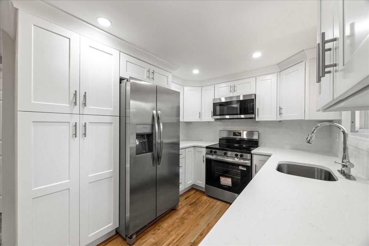 Interior, Kitchen, Recessed Lighting, Stainless Steel Appliances, Wood Texture Flooring