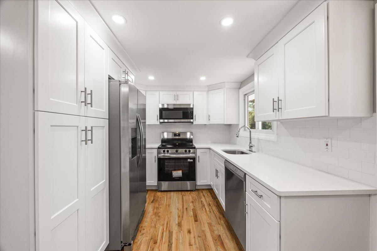 Interior, Kitchen, Recessed Lighting, Stainless Steel Appliances, Wood Texture Flooring