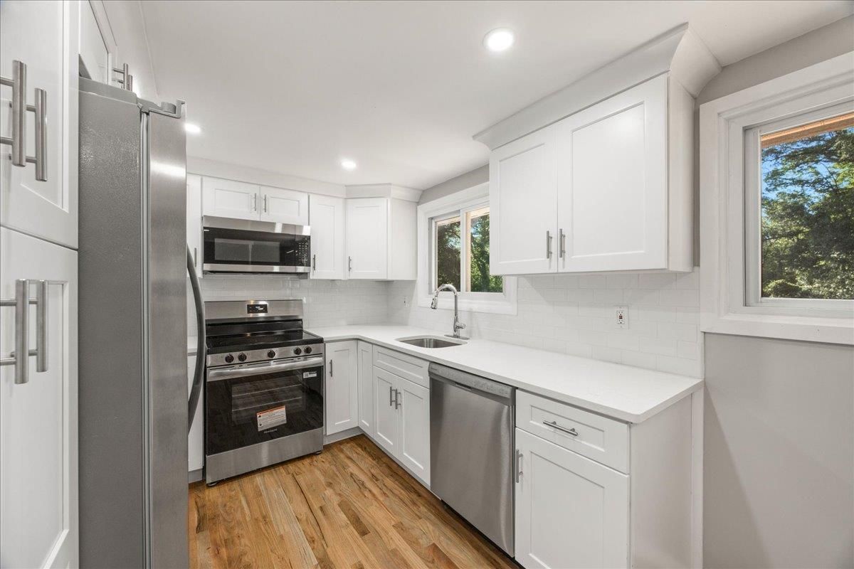 Interior, Kitchen, Recessed Lighting, Stainless Steel Appliances, Wood Texture Flooring