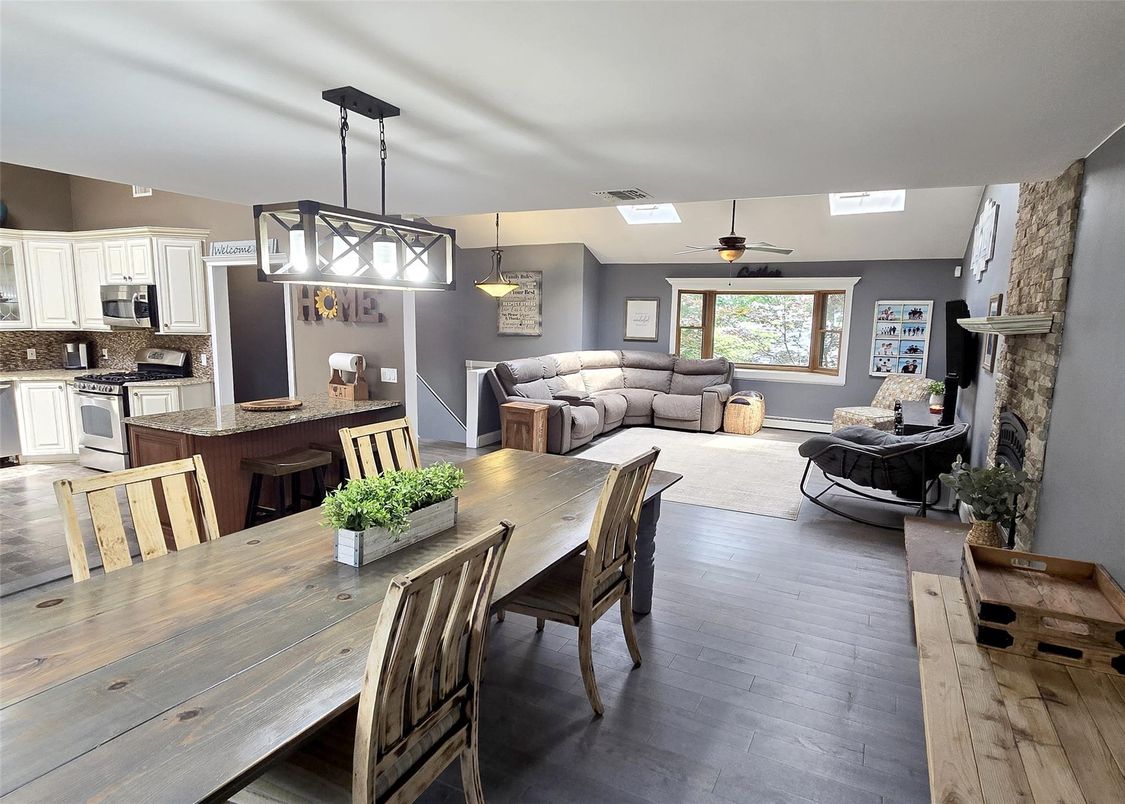 Dining room, Fireplace, Interior, Kitchen, Living room, Pendant Lights, Wood Texture Flooring