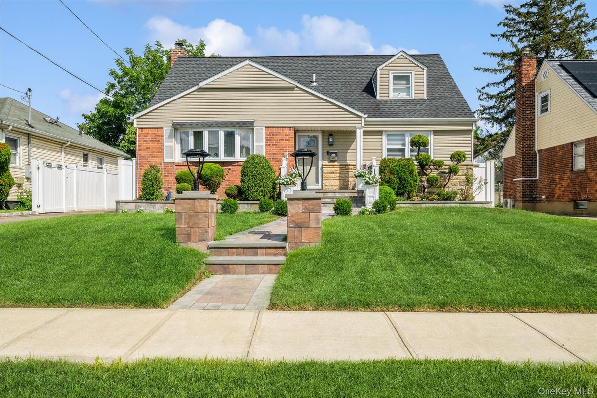 Exterior, Facade, Brick Facade, Cape Cod