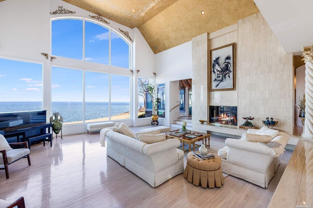 Fireplace, Interior, Living room, Piano, Recessed Lighting, Water, Wood Texture Flooring