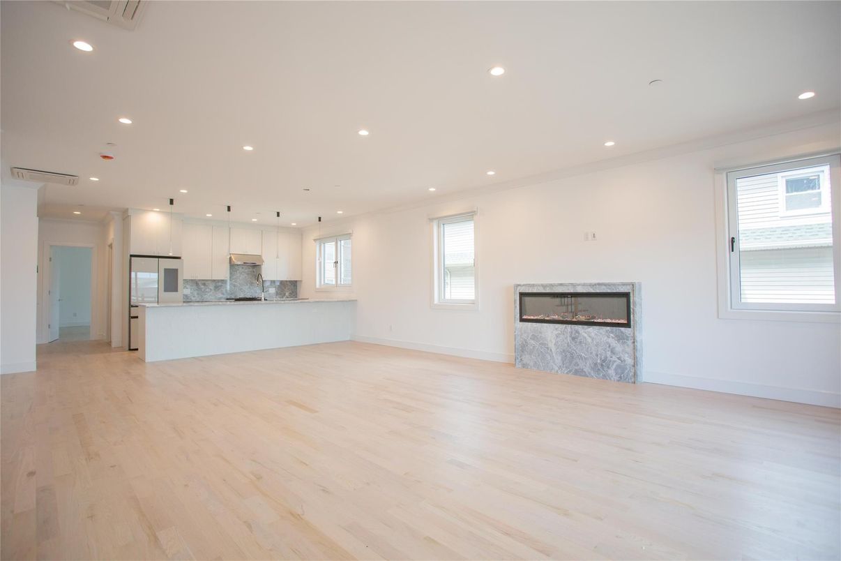 Empty room, Fireplace, Interior, Kitchen, Pendant Lights, Recessed Lighting, Wood Texture Flooring