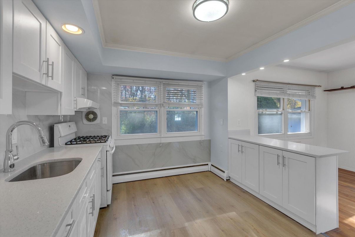 Interior, Kitchen, Marble Walls, Recessed Lighting, Wood Texture Flooring