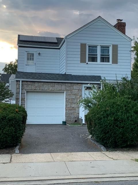 Attached, Exterior, Facade, Solar Panels, Rowhouse