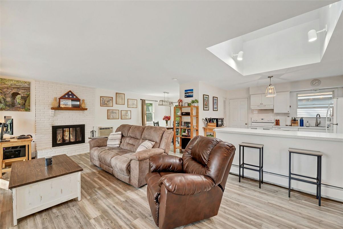 Fireplace, Interior, Kitchen, Living room, Pendant Lights, Stone Walls, Wood Texture Flooring