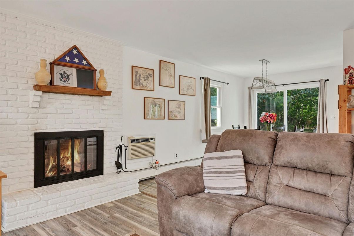 Fireplace, Interior, Living room, Pendant Lights, Stone Walls, Wood Texture Flooring
