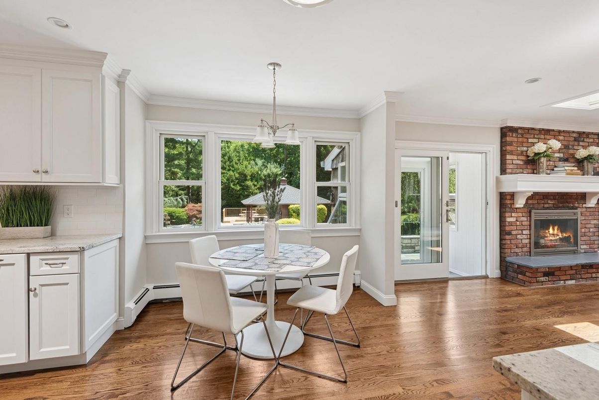 Dining room, Fireplace, Interior, Pendant Lights, Recessed Lighting, Stone Walls, Wood Texture Flooring