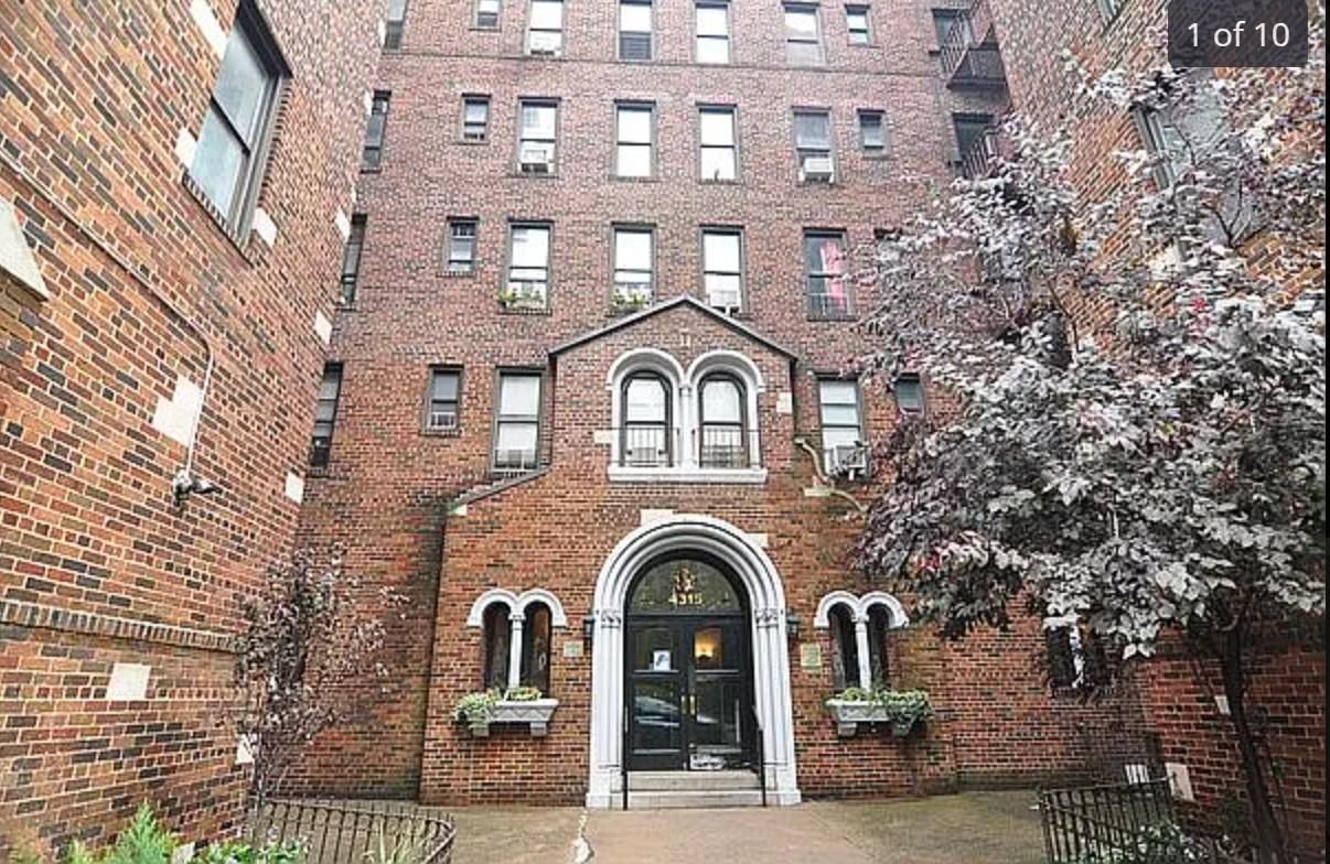 Exterior, Facade, Brick Facade, Condo Building