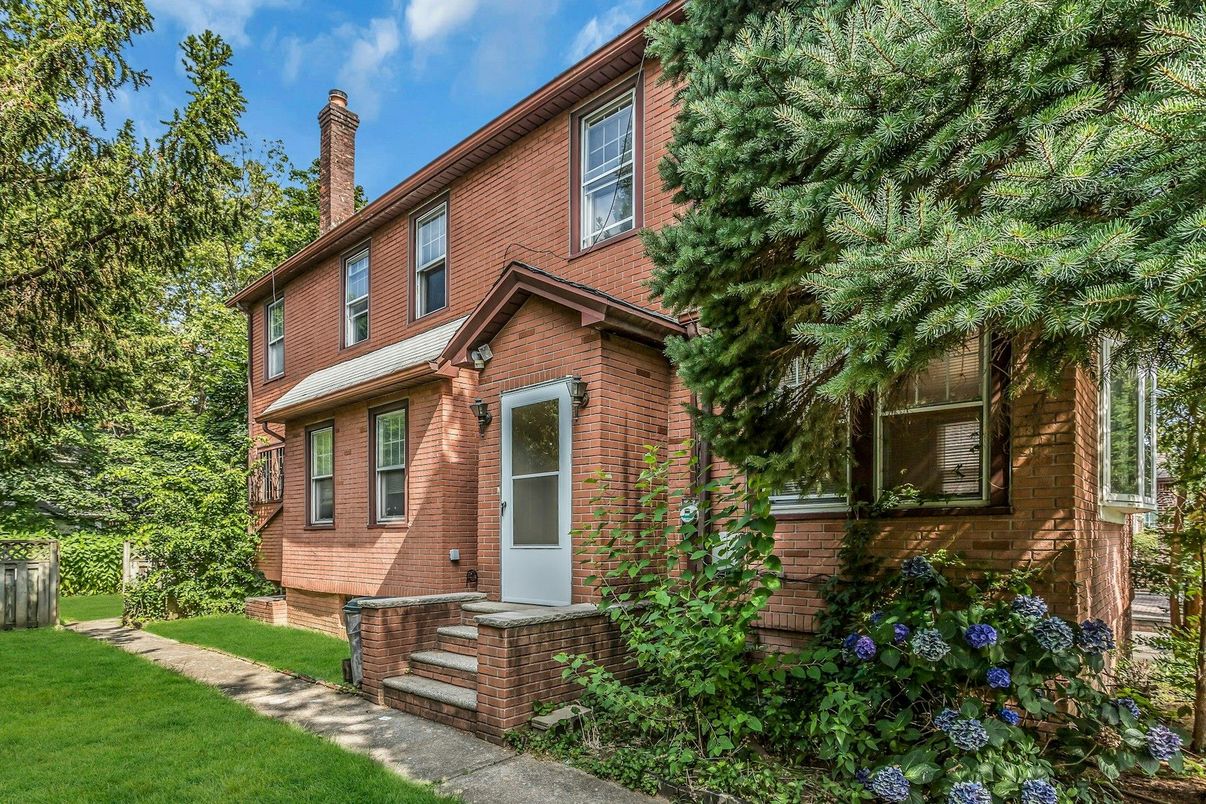 Exterior, Facade, Brick Facade, American Foursquare