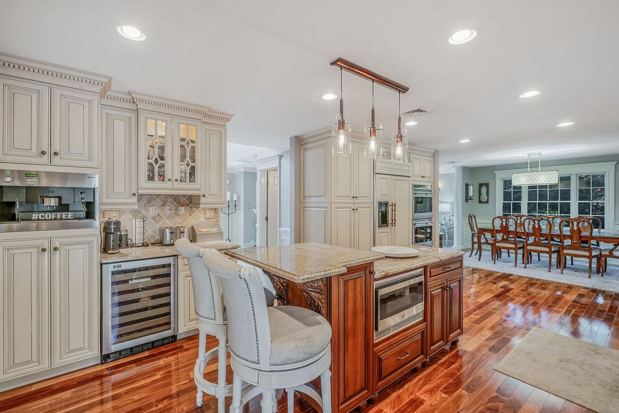 Dining room, Interior, Kitchen, Pendant Lights, Recessed Lighting, Stainless Steel Appliances, Wood Texture Flooring