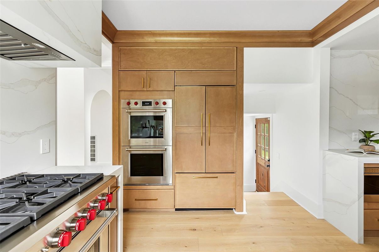 Interior, Kitchen, Marble Walls, Stainless Steel Appliances, Wood Texture Flooring