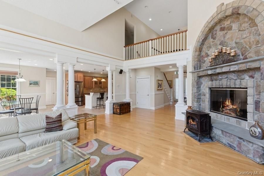 Dining room, Fireplace, Interior, Kitchen, Living room, Pendant Lights, Recessed Lighting, Stone Walls, Wood Texture Flooring