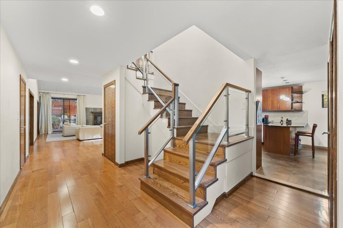 Dining room, Fireplace, Interior, Kitchen, Recessed Lighting, Wood Texture Flooring