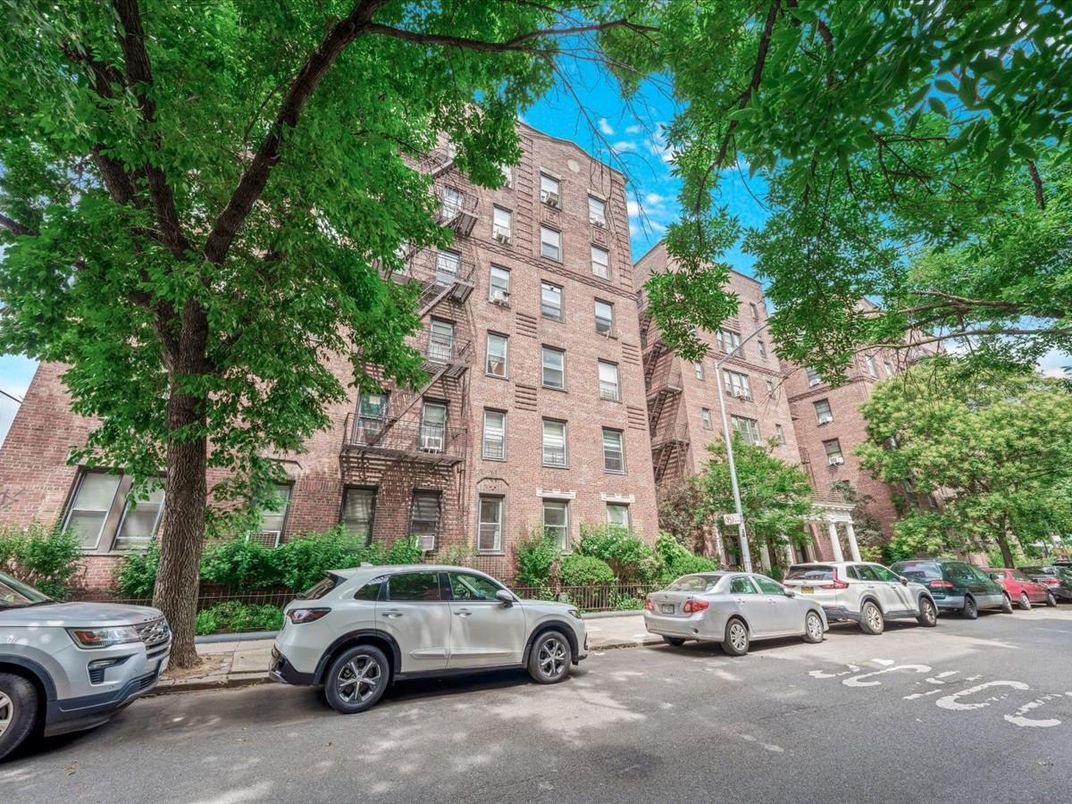 Exterior, Facade, Brick Facade, Condo Building