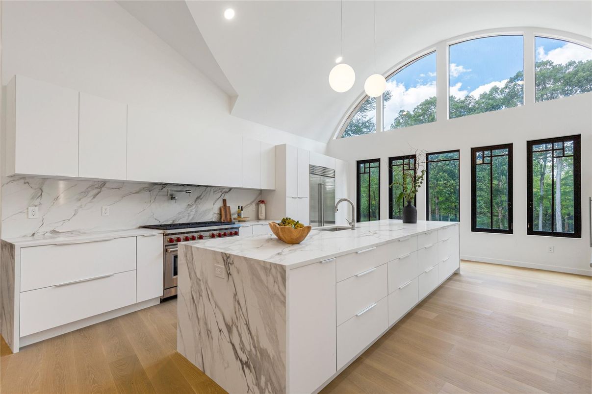 Interior, Kitchen, Marble Walls, Pendant Lights, Recessed Lighting, Wood Texture Flooring