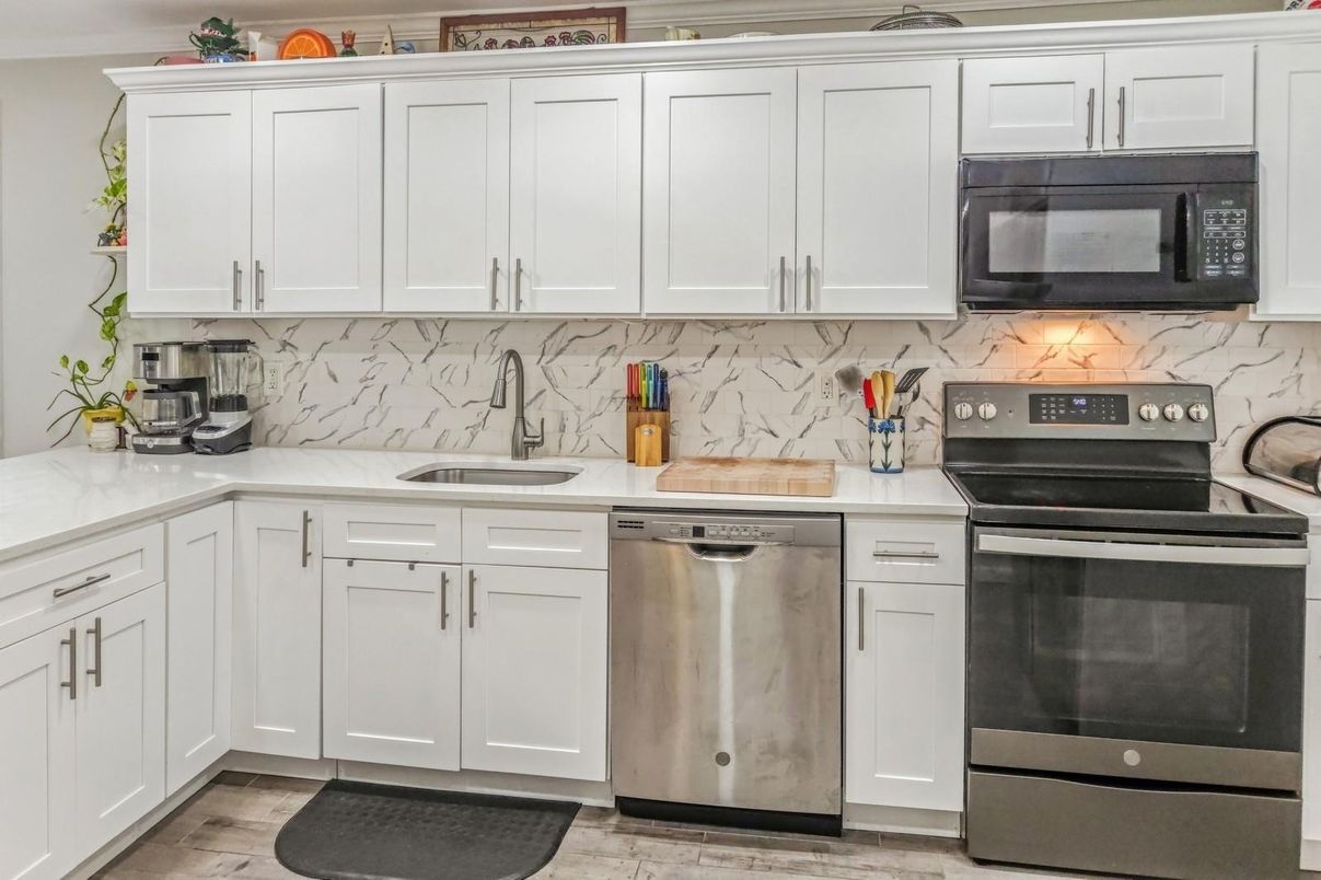 Interior, Kitchen, Marble Walls, Stainless Steel Appliances, Wood Texture Flooring
