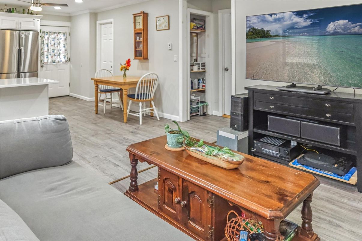 Dining room, Interior, Kitchen, Recessed Lighting, Stainless Steel Appliances, Wood Texture Flooring