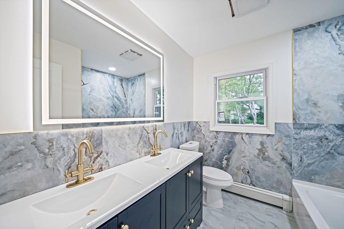 Bathroom, Dual Sink Vanities, Interior, Marble, Marble Walls, Recessed Lighting