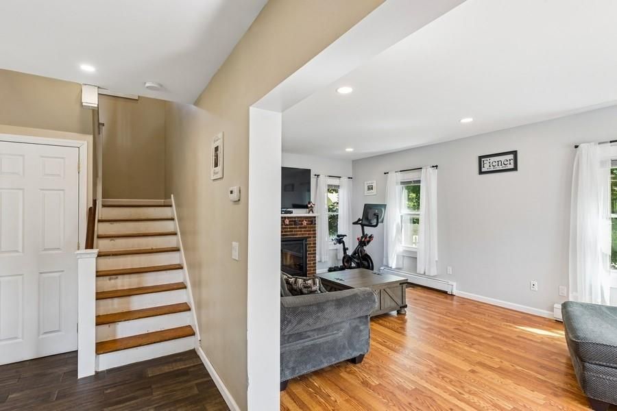 Fireplace, Fitness Equipment, Interior, Recessed Lighting, Wood Texture Flooring
