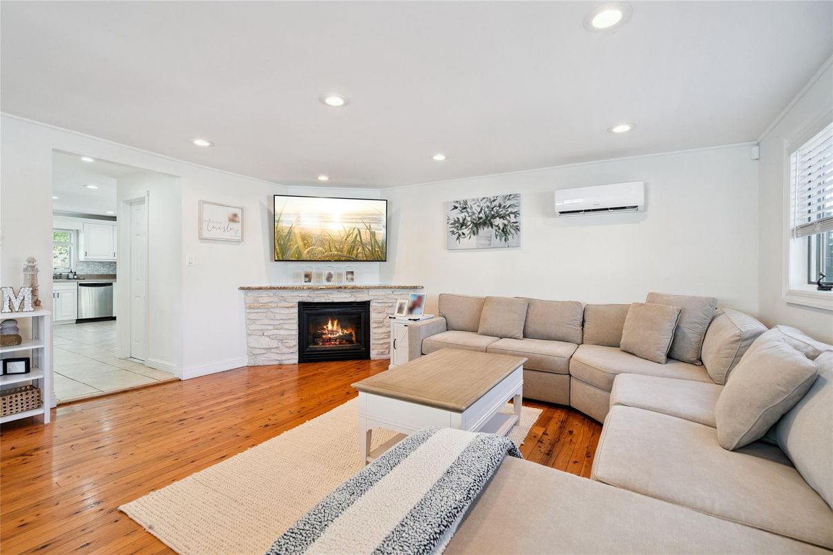 Fireplace, Interior, Living room, Recessed Lighting, Wood Texture Flooring