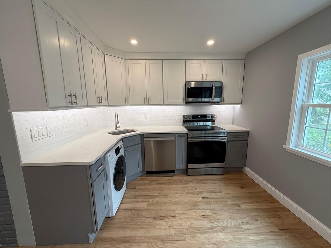 Interior, Kitchen, Recessed Lighting, Stainless Steel Appliances, Washer, Wood Texture Flooring