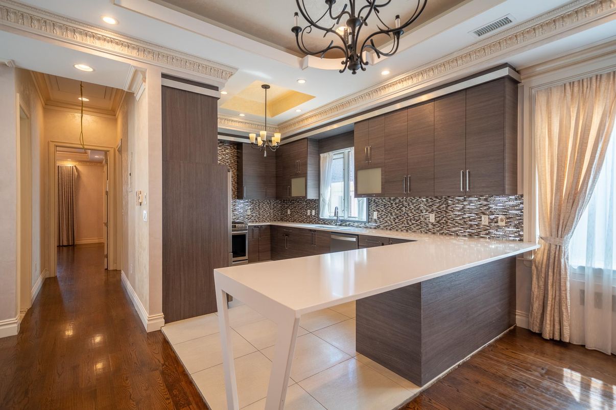 Chandelier, Interior, Kitchen, Pendant Lights, Recessed Lighting, Stainless Steel Appliances, Wood Texture Flooring