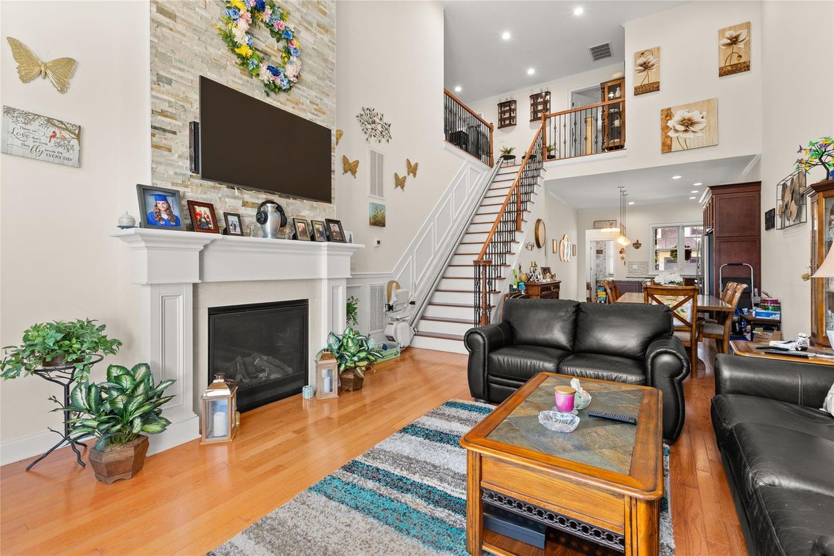 Dining room, Fireplace, Interior, Kitchen, Living room, Pendant Lights, Recessed Lighting, Stone Walls, Wood Texture Flooring