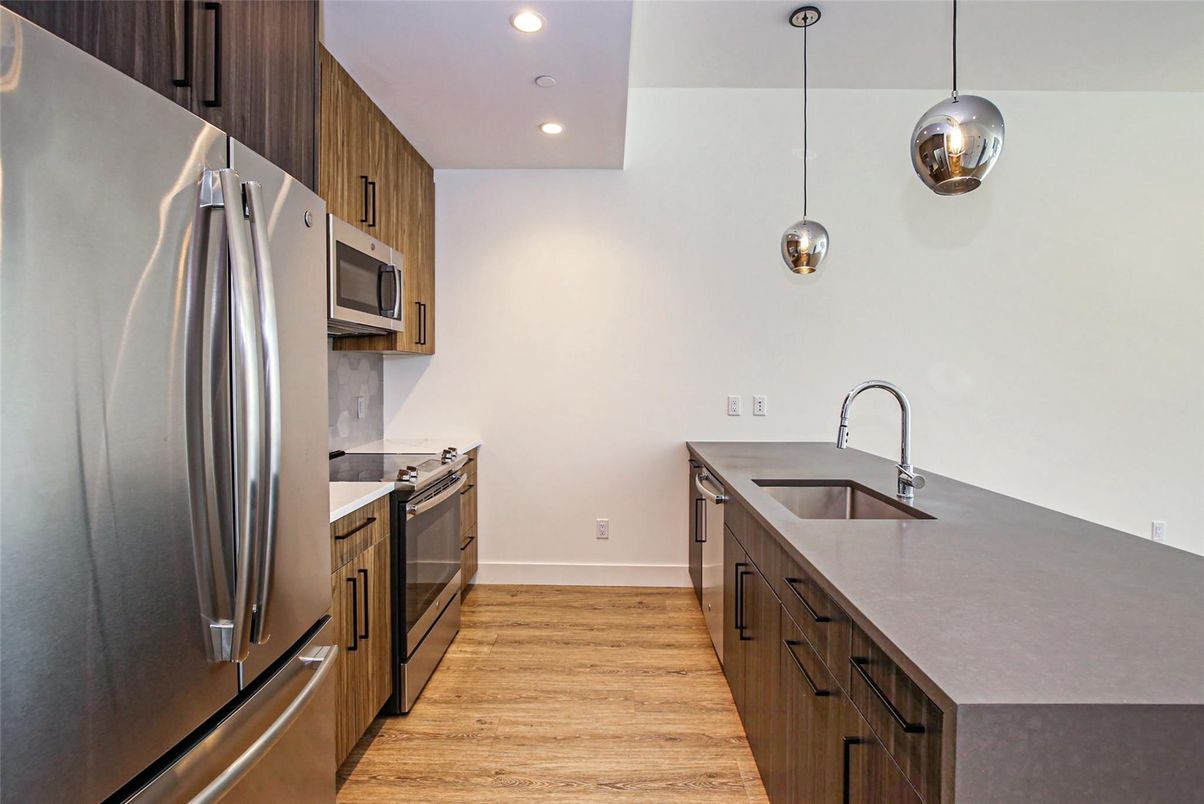 Interior, Kitchen, Pendant Lights, Recessed Lighting, Stainless Steel Appliances, Wood Texture Flooring