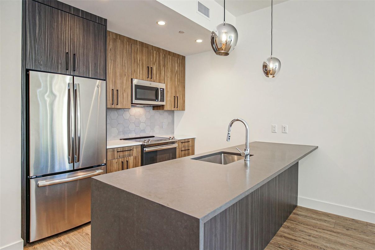 Interior, Kitchen, Pendant Lights, Recessed Lighting, Stainless Steel Appliances, Wood Texture Flooring