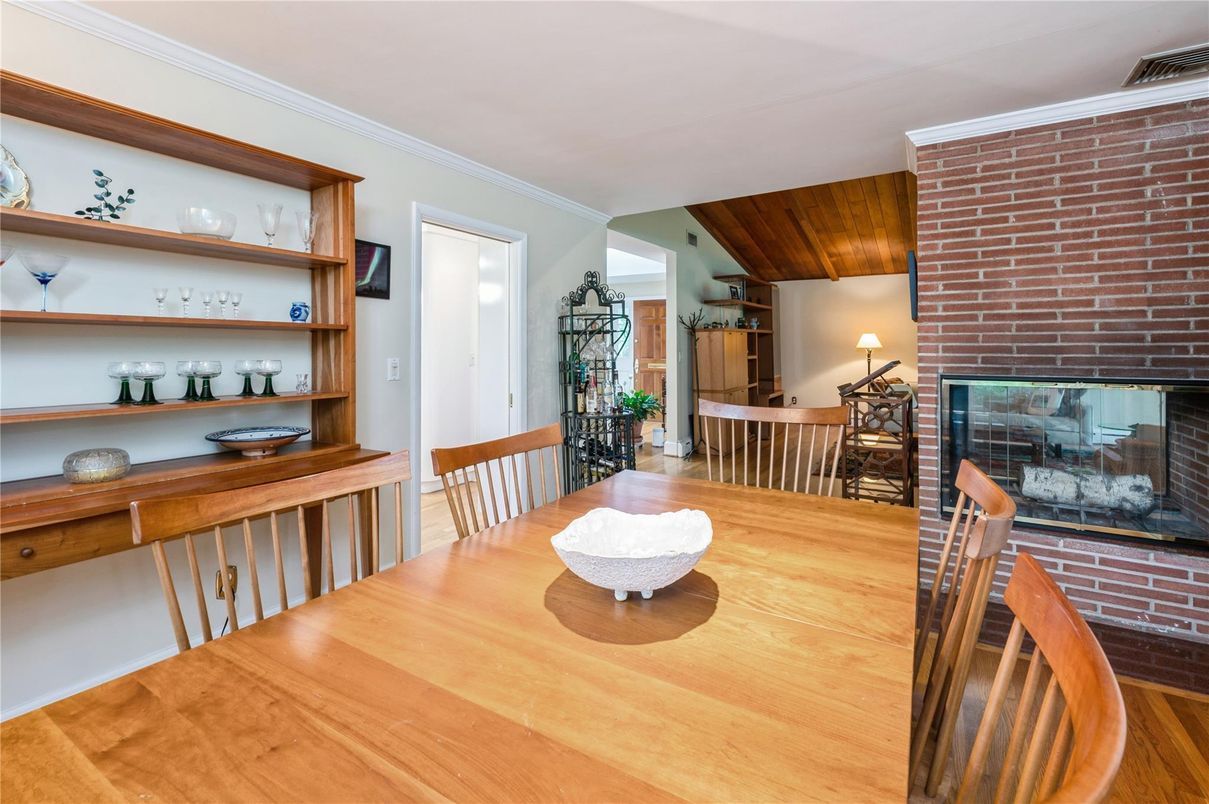 Dining room, Fireplace, Interior, Stone Walls, Wood Texture Flooring