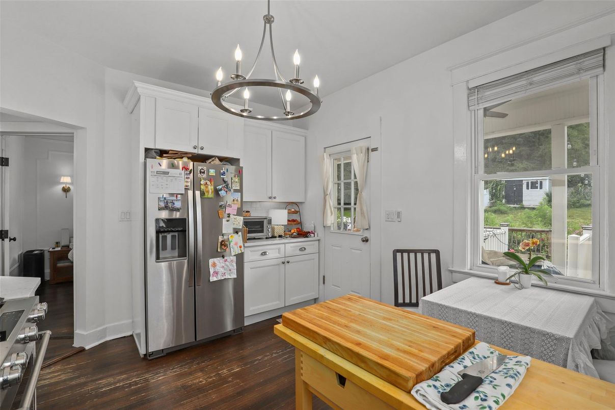 Chandelier, Dining room, Interior, Kitchen, Pendant Lights, Stainless Steel Appliances, Wood Texture Flooring