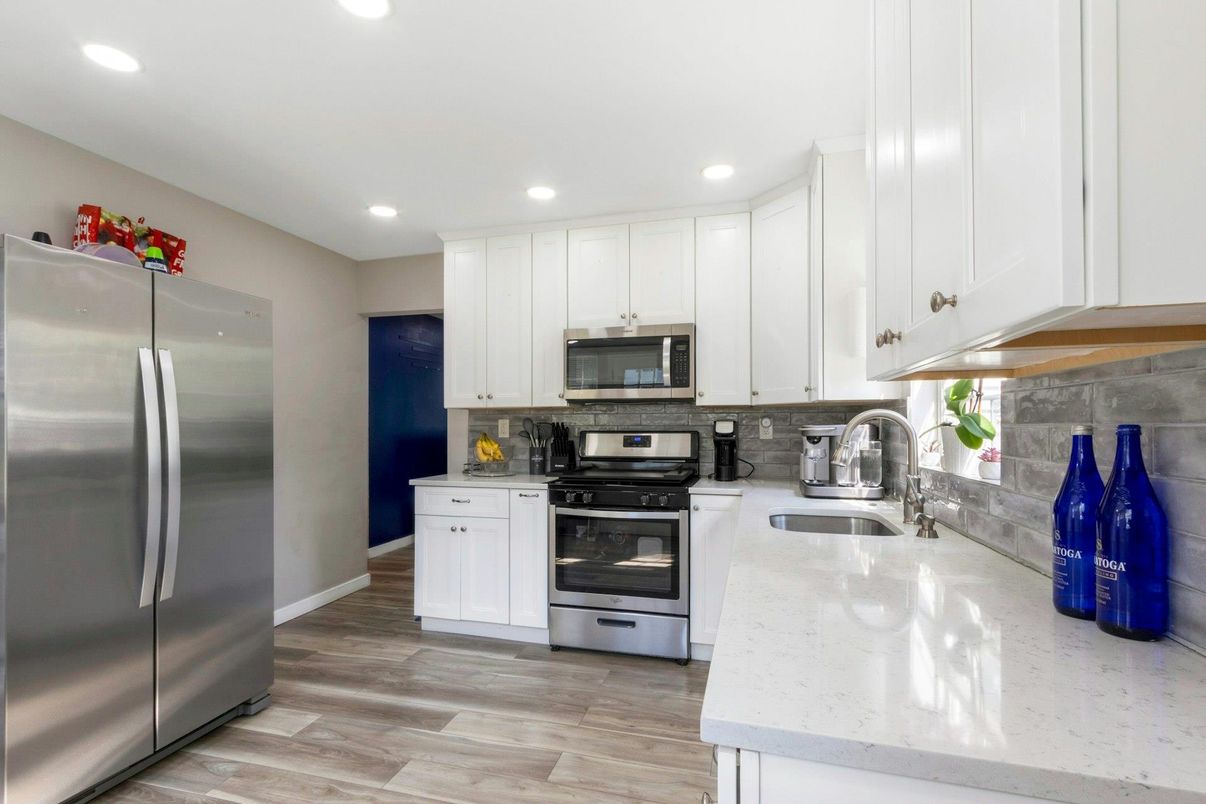 Interior, Kitchen, Recessed Lighting, Stainless Steel Appliances, Wood Texture Flooring