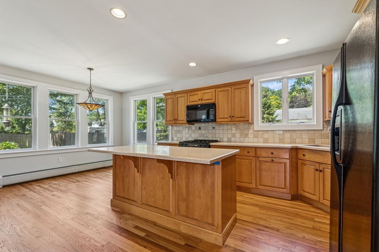 Interior, Kitchen, Pendant Lights, Recessed Lighting, Tile Countertops, Wood Texture Flooring