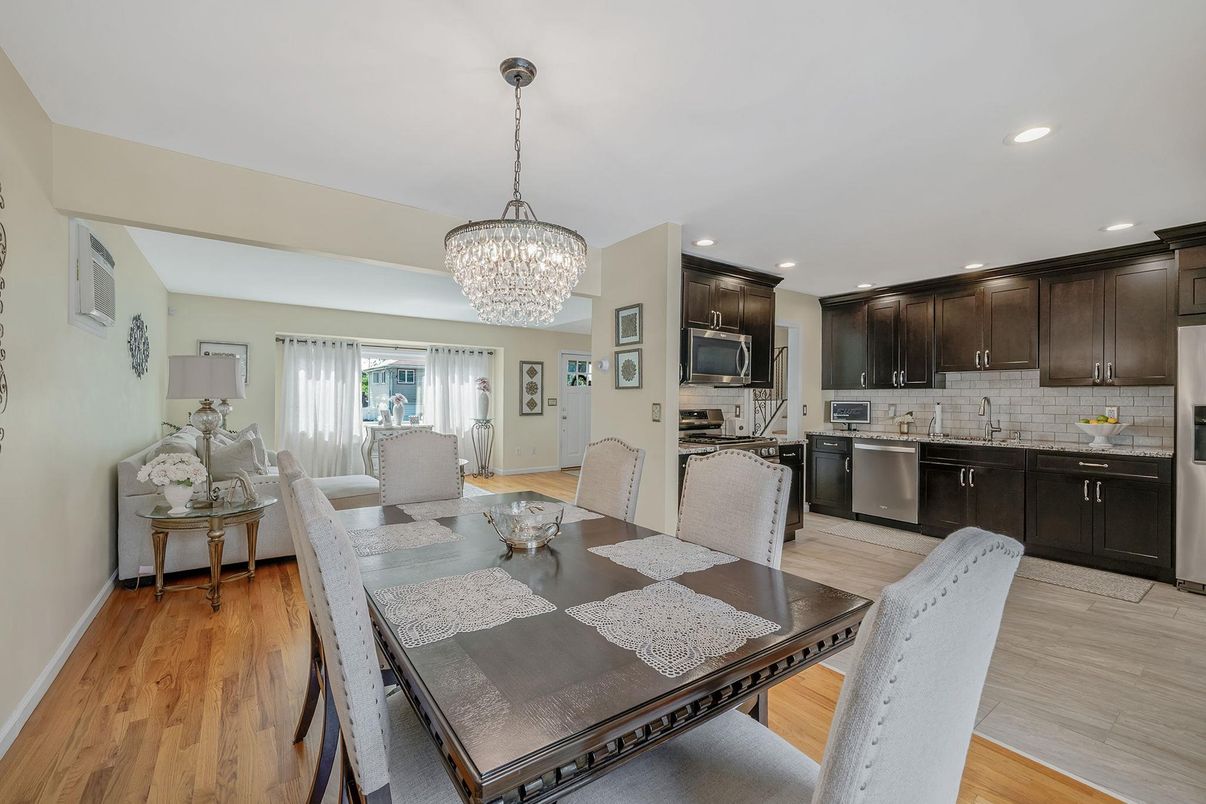 Chandelier, Dining room, Interior, Kitchen, Recessed Lighting, Stainless Steel Appliances, Wood Texture Flooring